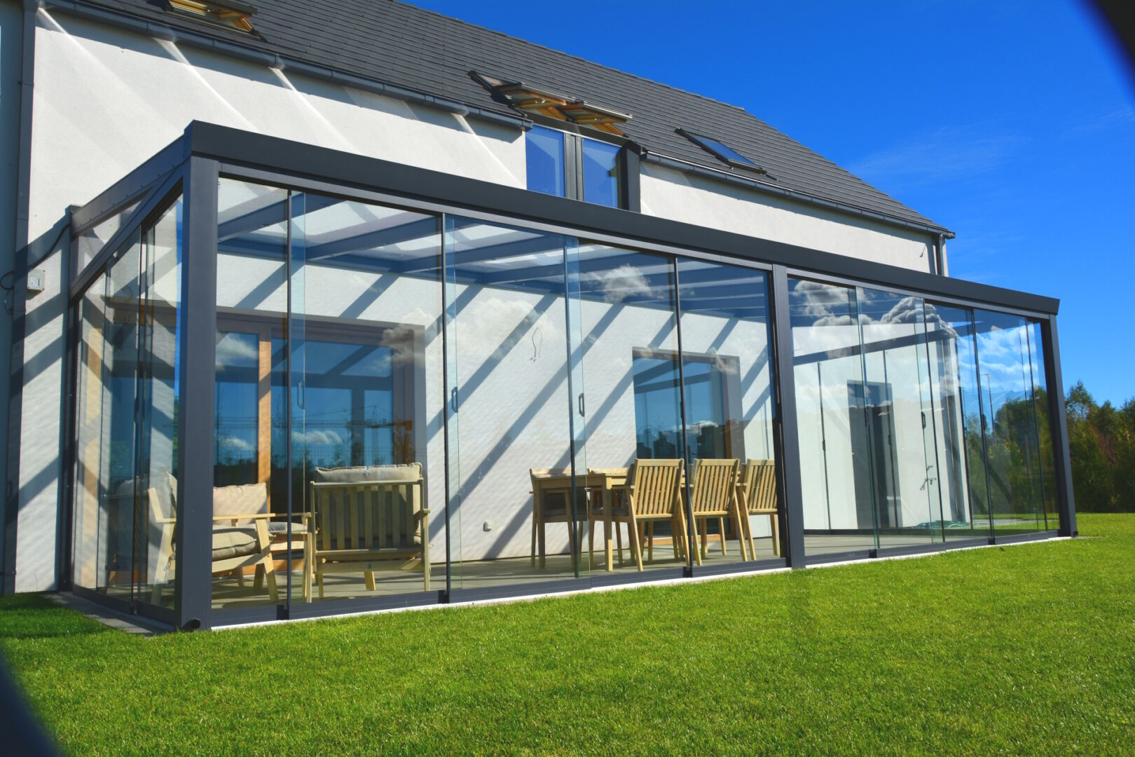 Zabudowa tarasu ze szkła i aluminium